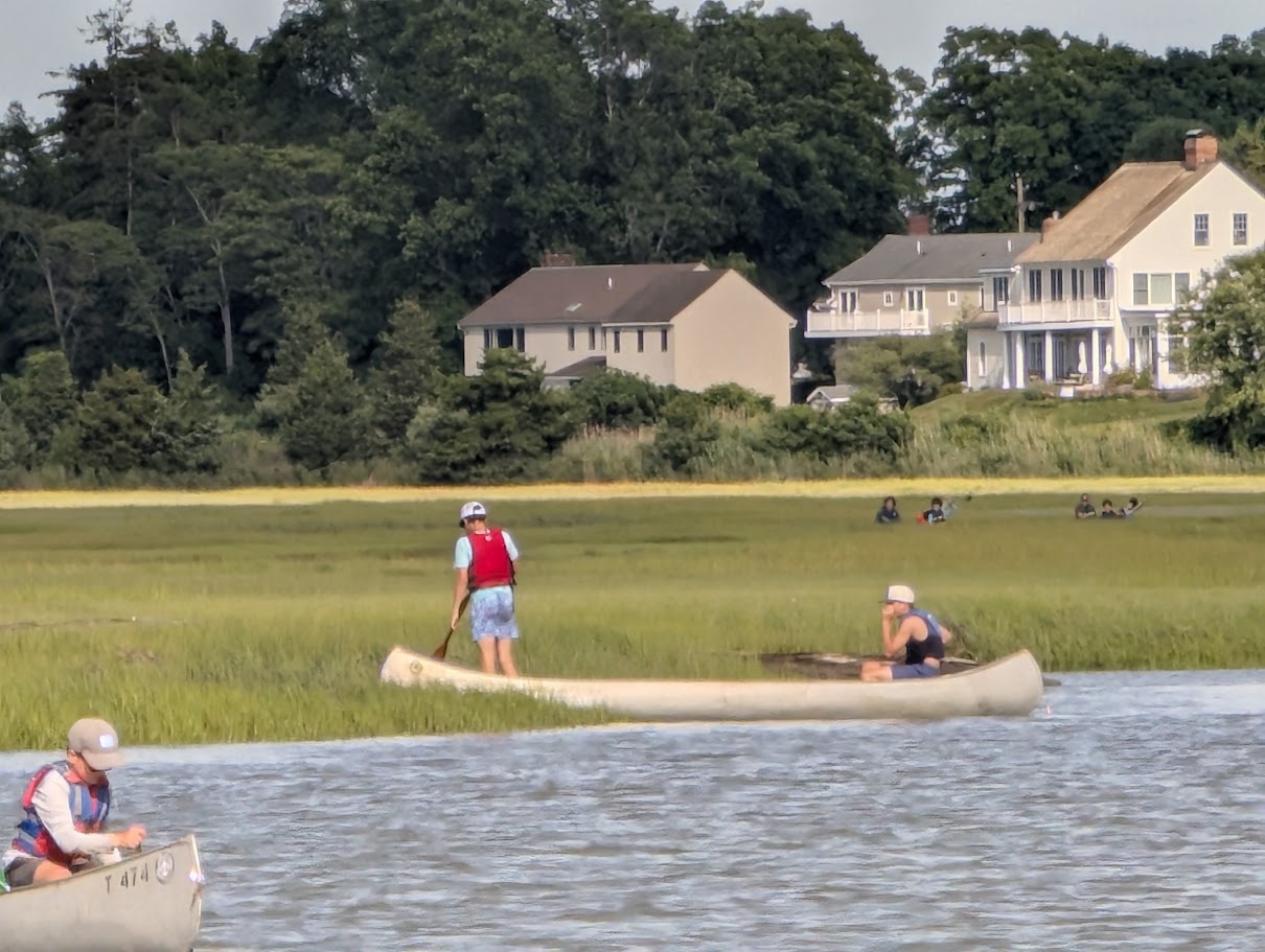 Scouts exploring from a canoe on the East River.